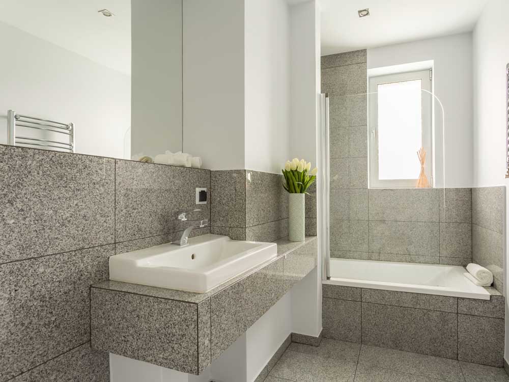Bathroom Tiles in Uganda. Bathroom tiles made from granite, quartz and marble slabs in Kampala Uganda. Supplied by S.S.G. Granites Ltd, a company leading in importation, processing and installation of quality stone slabs in Uganda and East Africa. ssggranites.com